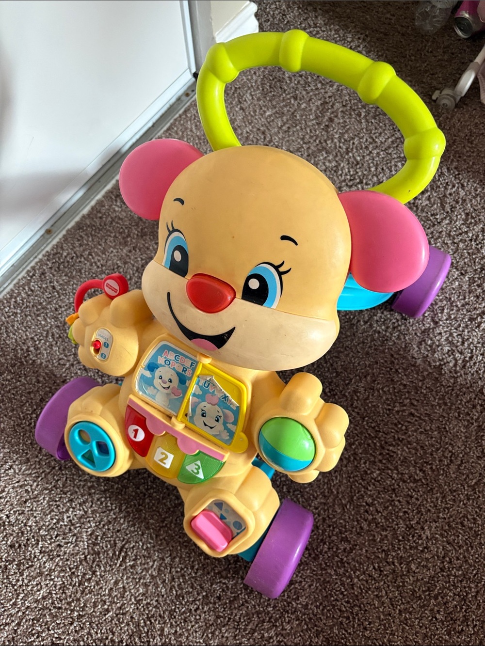 Fisher-Price Yellow Push Walker Puppy with Pink Ears and Purple Wheels